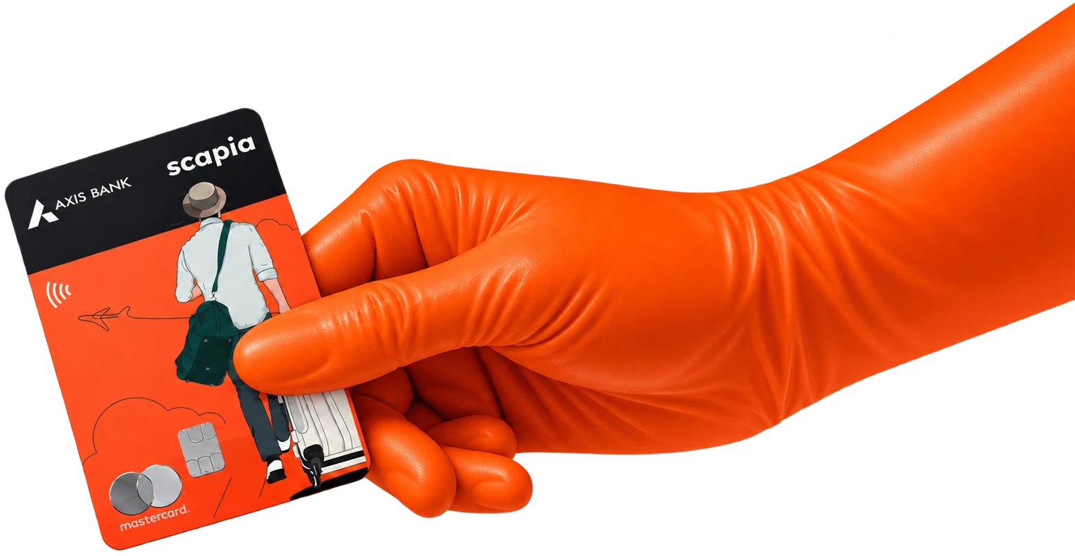Orange glove holding the Scapia card